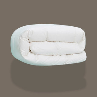 White comforter on a dark gray background