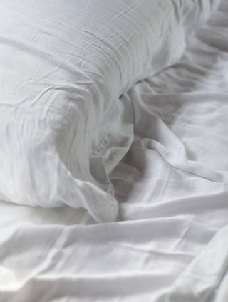 close up look of white sheets and pillow