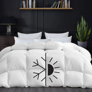 White comforter with a black symbol indicating cold and warm on a bed in a bedroom setting.